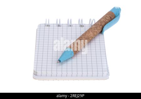 notepad with pen isolated on white background Stock Photo