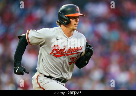 Download Adley Rutschman In Action On The Baseball Field Wallpaper