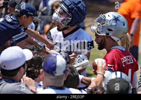 Dallas Cowboys quarterback Dak Prescott signs autographs during the NFL  football team's training camp Saturday, July 29, 2023, in Oxnard, Calif.  (AP Photo/Mark J. Terrill Stock Photo - Alamy