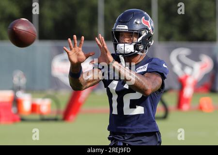 January 9, 2022: Houston Texans wide receiver Nico Collins (12) carries the  ball after a catch during an NFL game between the Texans and the Titans on  Jan. 9, 2022 in Houston