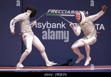 Kyosuke Matsuyama of Japan (L) competes during men's foil