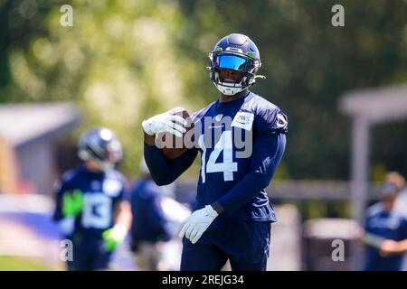 Seattle Seahawks wide receiver Tyjon Lindsey (81) holds a football while  running a receiving drill during the NFL football team's training camp,  Wednesday, July 26, 2023, in Renton, Wash. (AP Photo/Lindsey Wasson