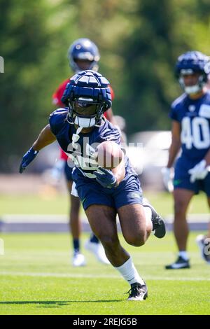 Seattle Seahawks running back Kenny McIntosh (25) runs on the field Monday,  May 22, 2023, at the team's NFL football training facility in Renton, Wash.  (AP Photo/Lindsey Wasson Stock Photo - Alamy