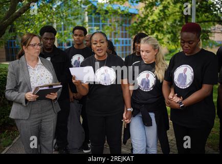 Senior investigating officer Detective Chief Inspector Julie Gowen (left) looks on as Michael Ugwa's mother Lauretta (2nd left) makes a statement outside Basildon Combined Court, Essex, after three people, Muhammad Khan, Brandon Lutchmunsing and Shannon Weston, were sentenced for their part in the death of father-of-three Michael Ugwa, 29, from Rainham, east London, who was stabbed at the food court of Lakeside shopping centre in Thurrock, Essex and died at the scene on April 28, 2022. Picture date: Friday July 28, 2023. Stock Photo