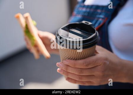 Close-up forewoman going to eat her lunch, healthy eating at work Stock Photo