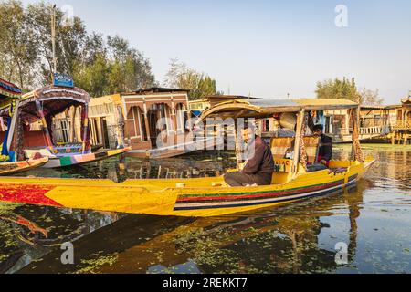 Rainawari, Srinagar, Jammu and Kashmir, India. October 24, 2022. Traditional shikara boat on Dal Lake. Stock Photo