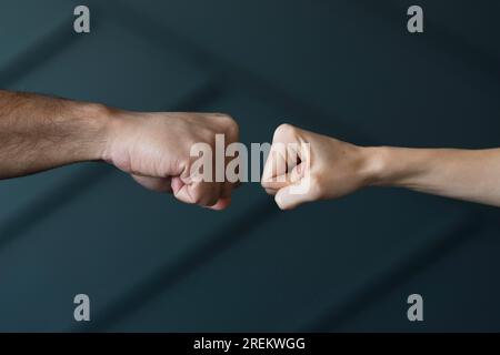 Close up friends ready touch fists. Beautiful photo Stock Photo