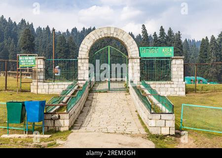 Khansahib Tehsil, Jammu and Kashmir, India. October 31, 2022. Metal gate to a hutment encampment area Stock Photo