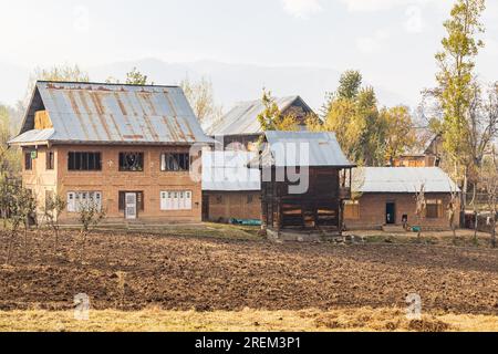 Khansahib Tehsil, Jammu and Kashmir, India. October 31, 2022. Houses in farm fields in Jammu and Kashmir. Stock Photo