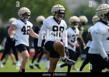 FILE - New Orleans Saints defensive end Scott Patchan (60) runs through  drills during training camp at their NFL football training facility in  Metairie, La., Thursday, Aug. 4, 2022. Guardian Caps helped