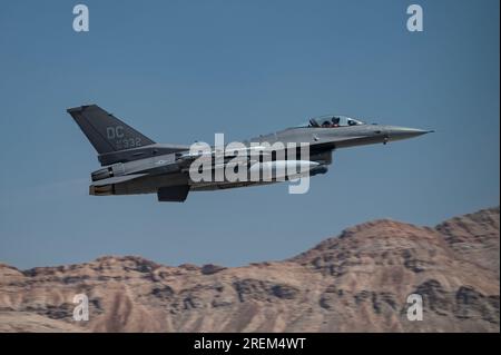 Nevada, USA. 24th July, 2023. An F-16 Fighting Falcon assigned to the 113th Wing, Joint Base Andrews, Md., takes off for a Red Flag 23-3 mission at Nellis Air Force Base, Nev., July 24, 2023. Red Flag provides unique training with an emphasis on Airmen and Guardians readiness for high-end warfighting and strategic competition. (Credit Image: © William Lewis/U.S. Air Force/ZUMA Press Wire) EDITORIAL USAGE ONLY! Not for Commercial USAGE! Stock Photo