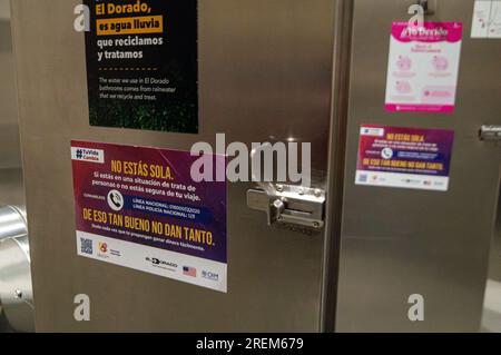 Bogota, Colombia. 28th July, 2023. Women bathrooms at El Dorado Internationa Airport show help lines and support messages during a play showing the risks and the ways in which people are tricked into illegal human trafficking networks, at El Dorado International Airport in Bogota, Colombia July 28, 2023. Photo by: Sebastian Barros/Long Visual Press Credit: Long Visual Press/Alamy Live News Stock Photo