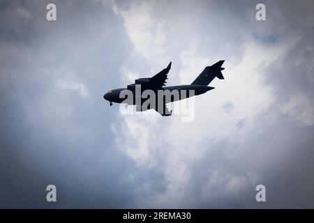 A U.S. Air Force C-17 Globemaster III with the 172nd Airlift Wing, Mississippi Air National Guard, flies over Joint Base McGuire-Dix-Lakehurst, New Jersey, July 27, 2023. The C-17 is capable of rapid strategic delivery of troops and all types of cargo to main operating bases or directly to forward bases in the deployment area. (New Jersey National Guard photo by Mark C. Olsen) Stock Photo