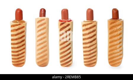Set of yummy French hot dogs with grilled buns and different sauces isolated on white Stock Photo