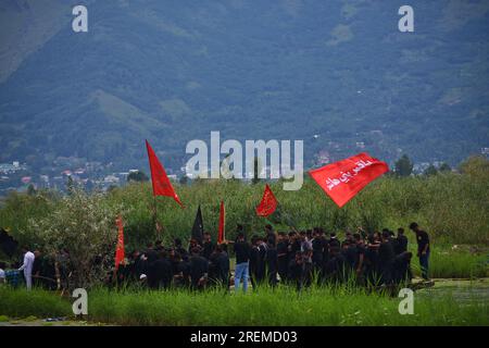 Kashmiri Shiite Muslims chant religious slogans as they participate in ...