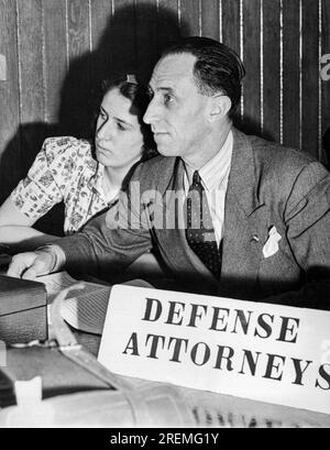 San Francisco, California:  July 12, 1939. A closeup of Harry Bridges, West Coast CIO leader, and his daughter, Jacqueline, 14, as they listen to proceedings in the Immigration Office on Angel Island during Bridges' deportation hearing. Stock Photo