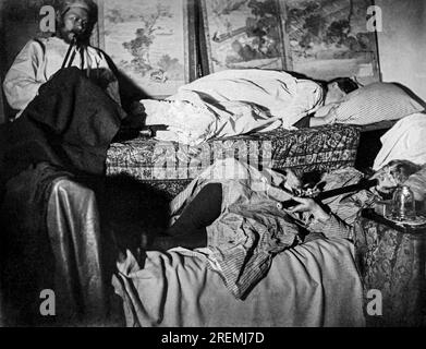 San Francisco, California:  c. 1900 White women in an opium den in Chinatown. Stock Photo