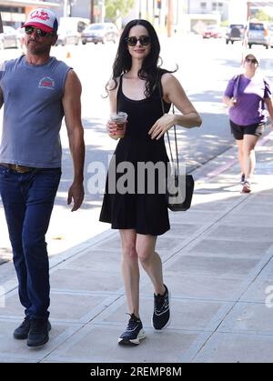 Actress Krysten Ritter seen out and about holding a half eaten apple in