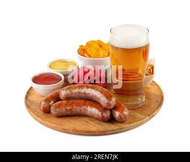 Glass of cold beer and different snacks on white background. Oktoberfest celebration Stock Photo