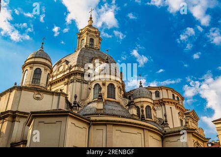 The intricate overlapping of the domes of the various altars and naves of the Consolata sanctuary. One of the oldest places of worship in Turin. Turin Stock Photo
