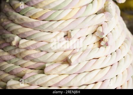 Long marshmallow candies on the counter in the candy shop in Prague Stock Photo