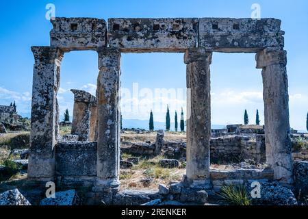 Pamukkale, Hierapolis Pamukkale Archeological Site (UNESCO Site), Natural Travertine Thermal Pools. Ruins of ancient city of old amphitheater. Stock Photo