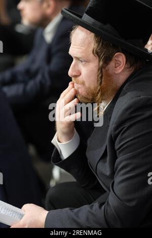 Profile photo on an orthodox Jewish man with long peyot inside a synagogue in Monsey, Rockland County, New York. Stock Photo