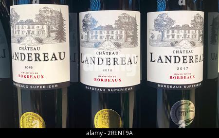 Viersen, Germany - June 9. 2023: Closeup of bottles french Bordeaux red wine Chateau Landeraux Stock Photo