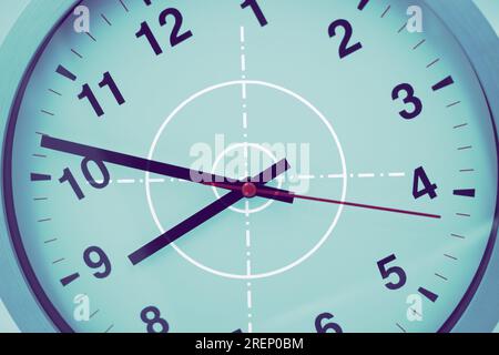 target on time clock for precision times or timing accuracy in minute and second tiktok to business success concept Stock Photo
