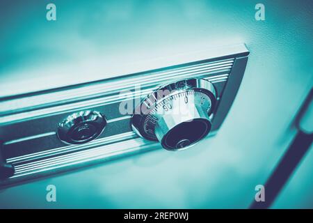 closeup rotation dial number key lock on safe box for security code image concept Stock Photo