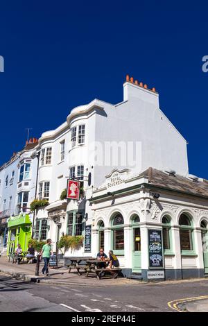 Exterior of The Royal Sovereign pub, people drinking outdoors on a sunny day, Brighton, East Sussex, England Stock Photo