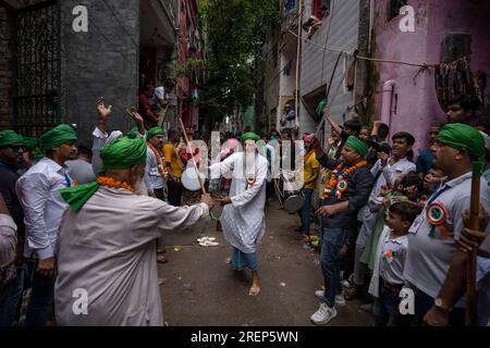 A young Muslim boy displays his stick-fighting skills during a procession  to mark Ashoura in New Delhi, India, Saturday, July, 29, 2023. Ashoura is  the tenth day of Muharram, the first month