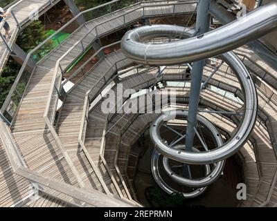 Bad Wildbad, Germany. 29th July, 2023. The treetop path with its slide on the Sommerberg in Bad Wildbad. The popular tourist attraction in the northern Black Forest is 1250 meters long and ends in the tower at a height of 40 meters. Credit: Marco Krefting/dpa/Alamy Live News Stock Photo