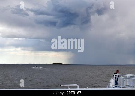 Bad weather threatening at sea. The horizon seen from a ferry. Stock Photo