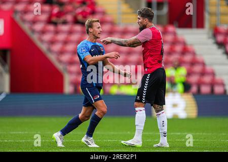 Santa Cristina Gherdeina, Italy. 24 July 2021. Lyanco Vojnovic (R) of Torino  FC competes for the ball with Emanuele Bocchio of SSC Brixen during the  pre-season friendly football match between Torino FC