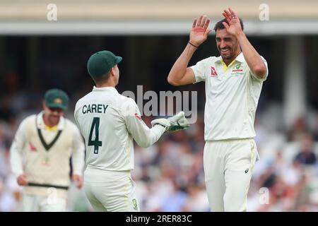 Mitchell Starc of Australia celebrates the dismissal of Jonny Bairstow of England during the LV= Insurance Ashes Fifth Test Series Day Three match England vs Australia at The Kia Oval, London, United Kingdom, 29th July 2023  (Photo by Gareth Evans/News Images) Stock Photo