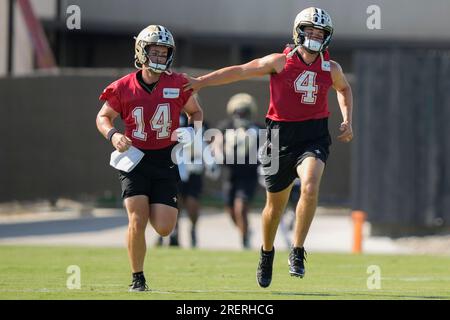 New Orleans Saints quarterback Jake Haener (14) runs through drills at the  NFL team's football training camp in Metairie, La., Friday, Aug. 4, 2023.  (AP Photo/Gerald Herbert Stock Photo - Alamy