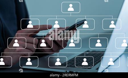 Businessman touching virtual network icons at home office Stock Photo