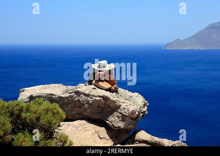 Views on the path from Livadia to Lethra beach along the rocky mountain path, Tilos island, Dodecanese island group. Greece, July 2023 Stock Photo