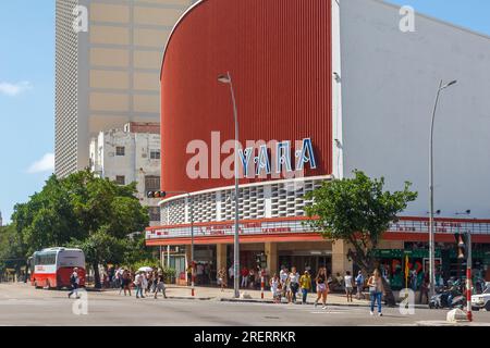 Havana, Cuba,  Group of people walking by the Yara Cinema in the downtown district. Lifestyle of real people in the Cuban capital city Stock Photo