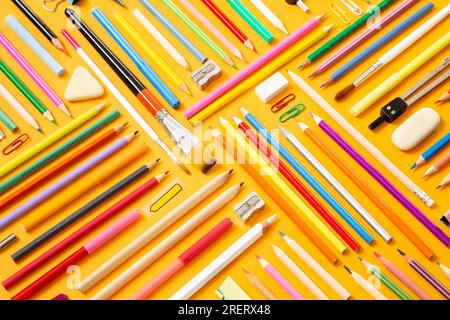 School supplies on yellow background Stock Photo