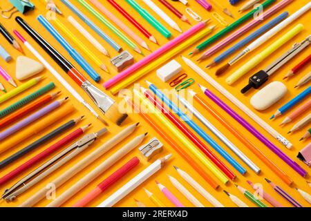 School supplies on yellow background Stock Photo