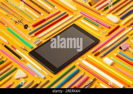 School supplies with a tablet Stock Photo