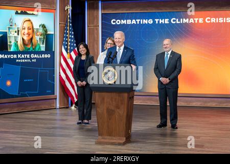 Washington, United States of America. 27 July, 2023. U.S President Joe Biden delivers remarks on new measures aimed at protecting communities from extreme weather at the South Court Auditorium of the White House, July 27, 2023 in Washington, D.C. Joining Biden from left are; Acting Secretary of Labor Julie Su, Federal Emergency Management Agency Administrator Deanne Criswell, and National Oceanic and Atmospheric Administration Administrator Dr. Rick Spinrad.  Credit: Adam Schultz/White House Photo/Alamy Live News Stock Photo