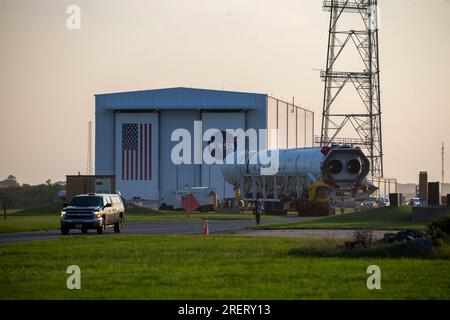Wallops Island, United States of America. 28 July, 2023. The Northrop Grumman Antares rocket carrying the unmanned Cygnus spacecraft departs the Horizontal Integration Facility to Launch Pad-0A of the Mid-Atlantic Regional Spaceport at NASA Wallops Flight Facility, July 28, 2023 in Wallops Island, Virginia, USA. The spacecraft is expected to launch August 1st with 8,200 pounds of supplies for the International Space Station. Credit: Patrick Black/NASA/Alamy Live News
