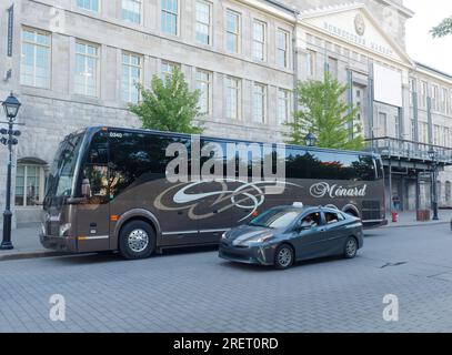 Menard charter coach bus parked curbside in old Montreal, Quebec,Canada Stock Photo