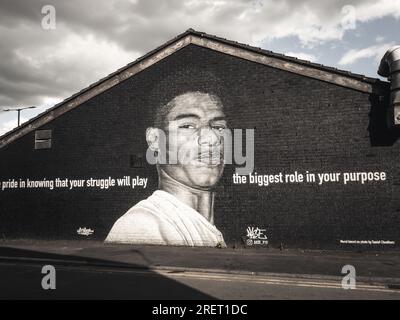 Close up of a small part of the giant Manchester United player Marcus  Rashford mural in Withington, Manchester, England, United Kingdom, that was  vandalised with abusive graffiti after England's Euro2020 football loss