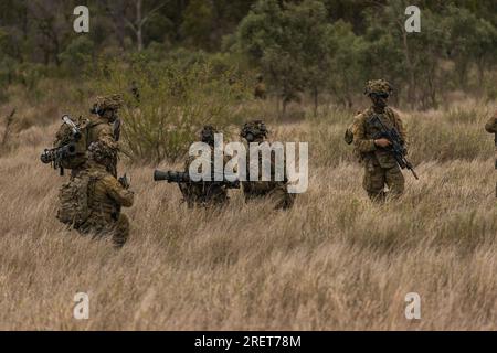 Soldiers from Battle Group Ram conduct air mobility operations supported by Battle Group Griffin during exercise Talisman Sabre 23 in Townsville Field Training Area, Queensland, Australia, July 26, 2023. Battle Group Ram consists of soldiers from Australia, United States, New Zealand, Fiji and France.     Talisman Sabre is a large-scale, bilateral military exercise between Australia and the United States which strengthens relationships and interoperability among key allies and enhances our collective capabilities to respond to a wide array of potential security concerns. This exercise will be Stock Photo
