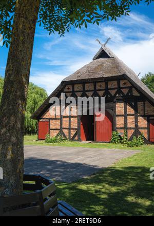 Beautiful house with a thatched roof on the Baltic Sea Stock Photo
