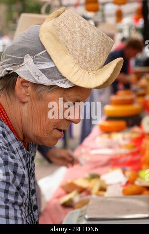 Cheese woman at the cheese market in Alkmaar Stock Photo